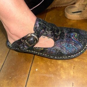 Alegria slip on shoes. Broke in an very comfortable to wear if your on your feet